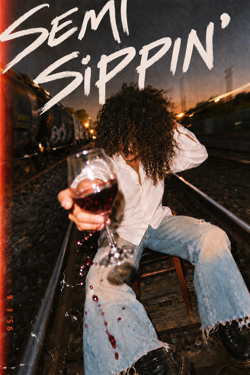The poster: the name in a dry brush, wine, a shirt, the tracks